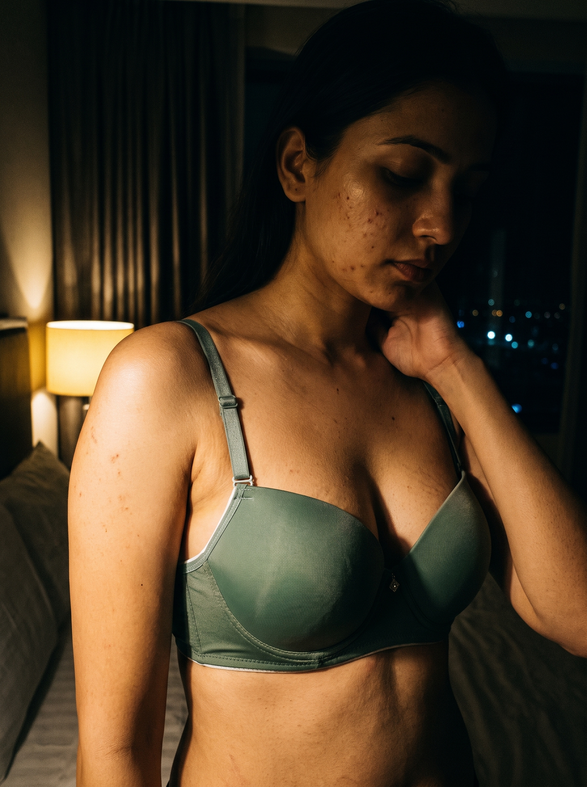 Model wearing a forest green push-up bra from the AZADEH new arrivals